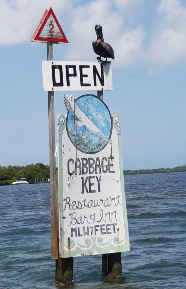 sun-island-cape-coral-charter-boats-and-services-sign-on-the-water